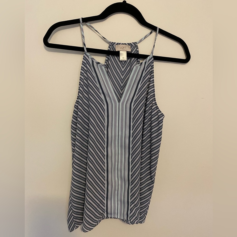 Loft outlet tank